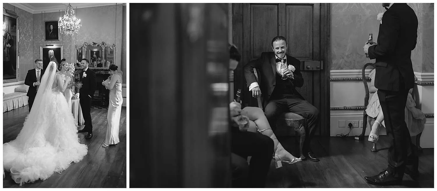 Hedingham Castle Wedding Photographer - guests drinking and laughing in the main house