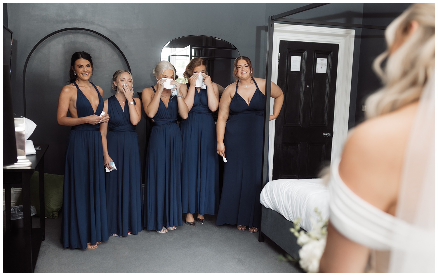 Weddings at Swynford Manor - The bride reveals her dress to her bridesmaids