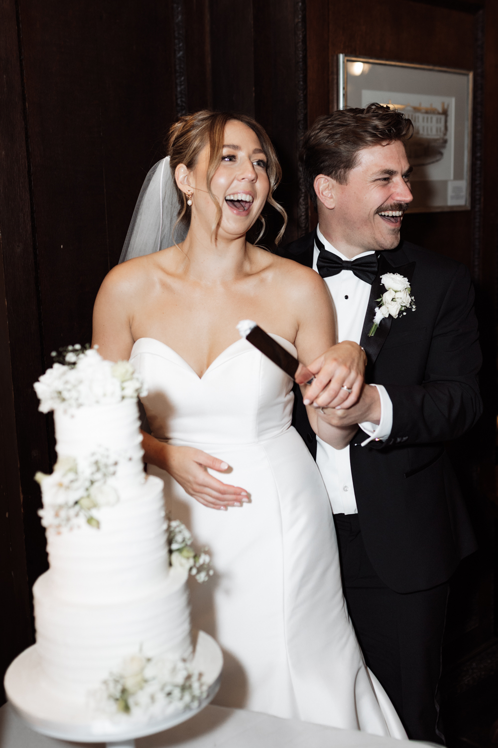 Candid, relaxed cake cut at Gosfield Hall in Halstead