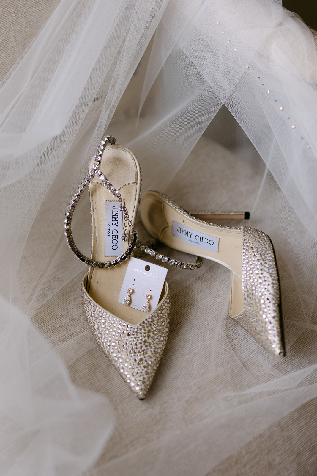 Molly's sparkling Jimmy Choo bridal shoes and earrings
