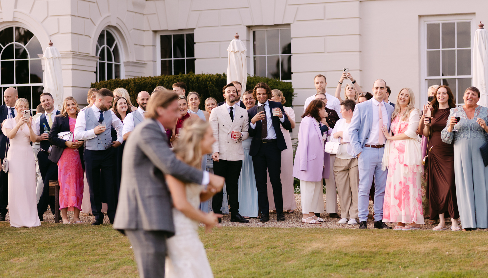 Molly and Taylor having their first dance outside on the lawn at Gosfield Hall